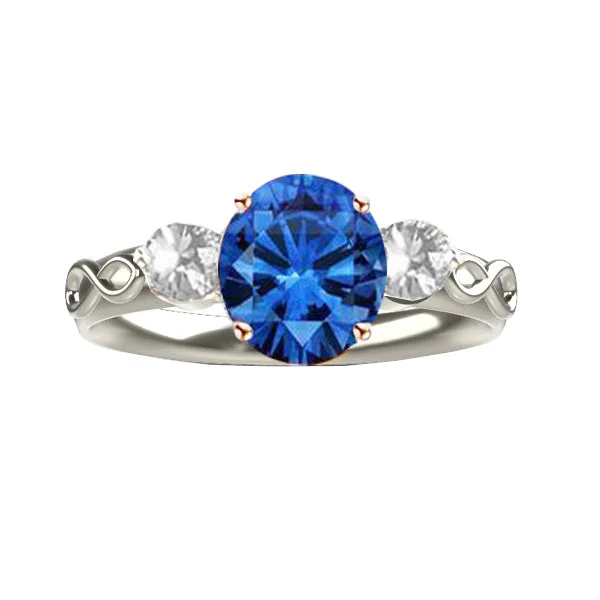 Designer Wedding Ring-SCOTTISH INFINITY ENGAGEMENT RING WITH SAPPHIRE AND TWO DIAMONDS